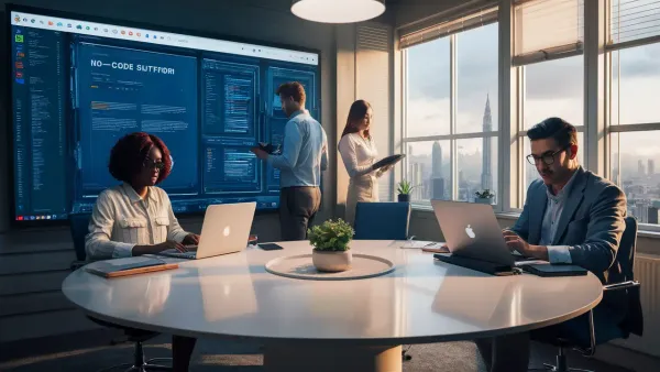 Profissionais trabalham em escritório moderno com laptops e tela digital mostrando interface de software no-code.